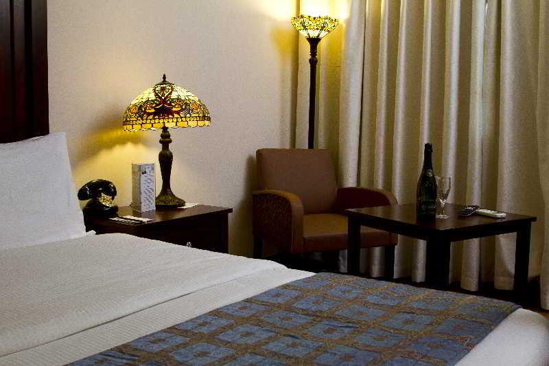 Protea Hotel By Marriott Dar Es Salaam Courtyard Экстерьер фото