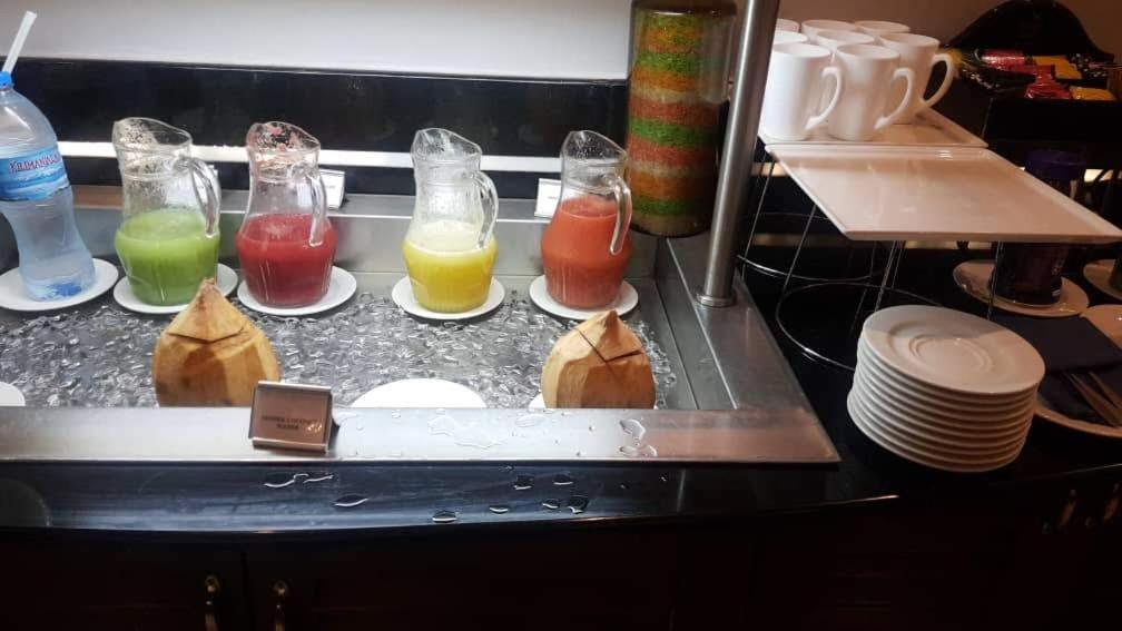 Protea Hotel By Marriott Dar Es Salaam Courtyard Экстерьер фото