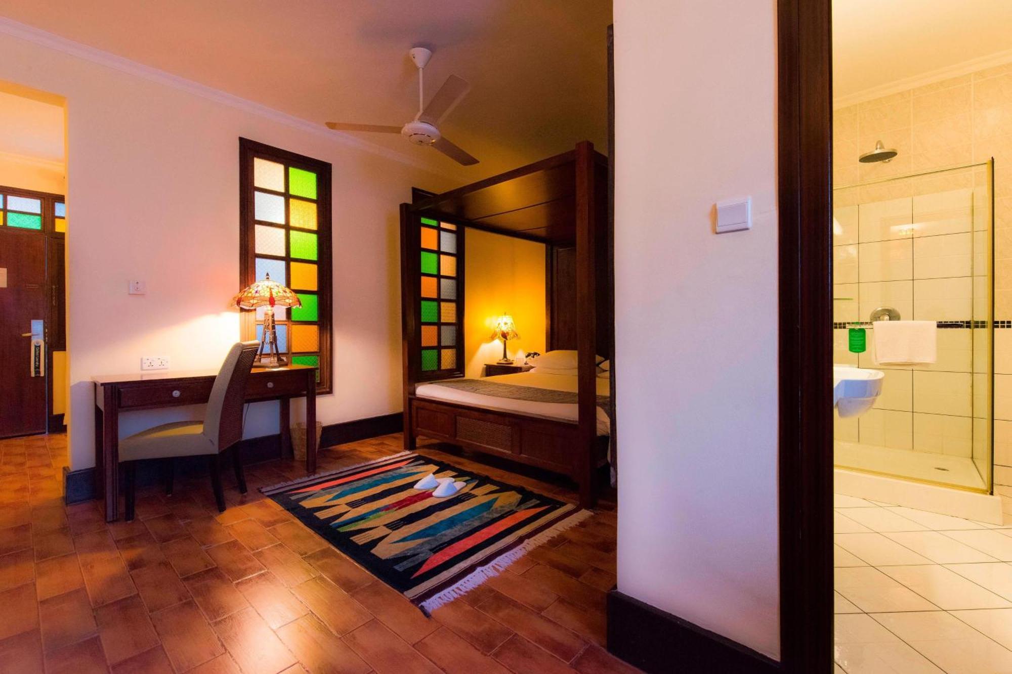Protea Hotel By Marriott Dar Es Salaam Courtyard Экстерьер фото