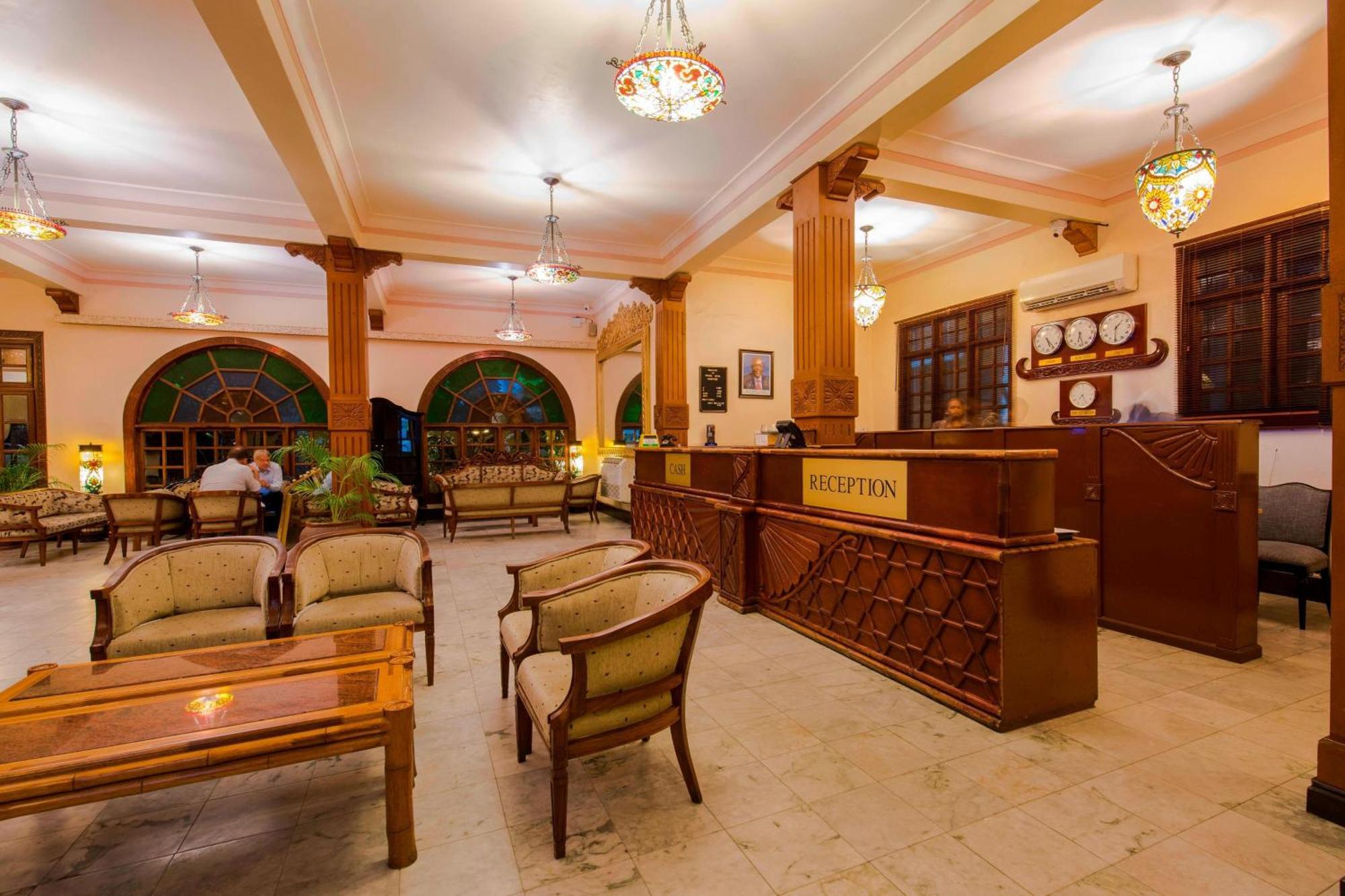 Protea Hotel By Marriott Dar Es Salaam Courtyard Экстерьер фото
